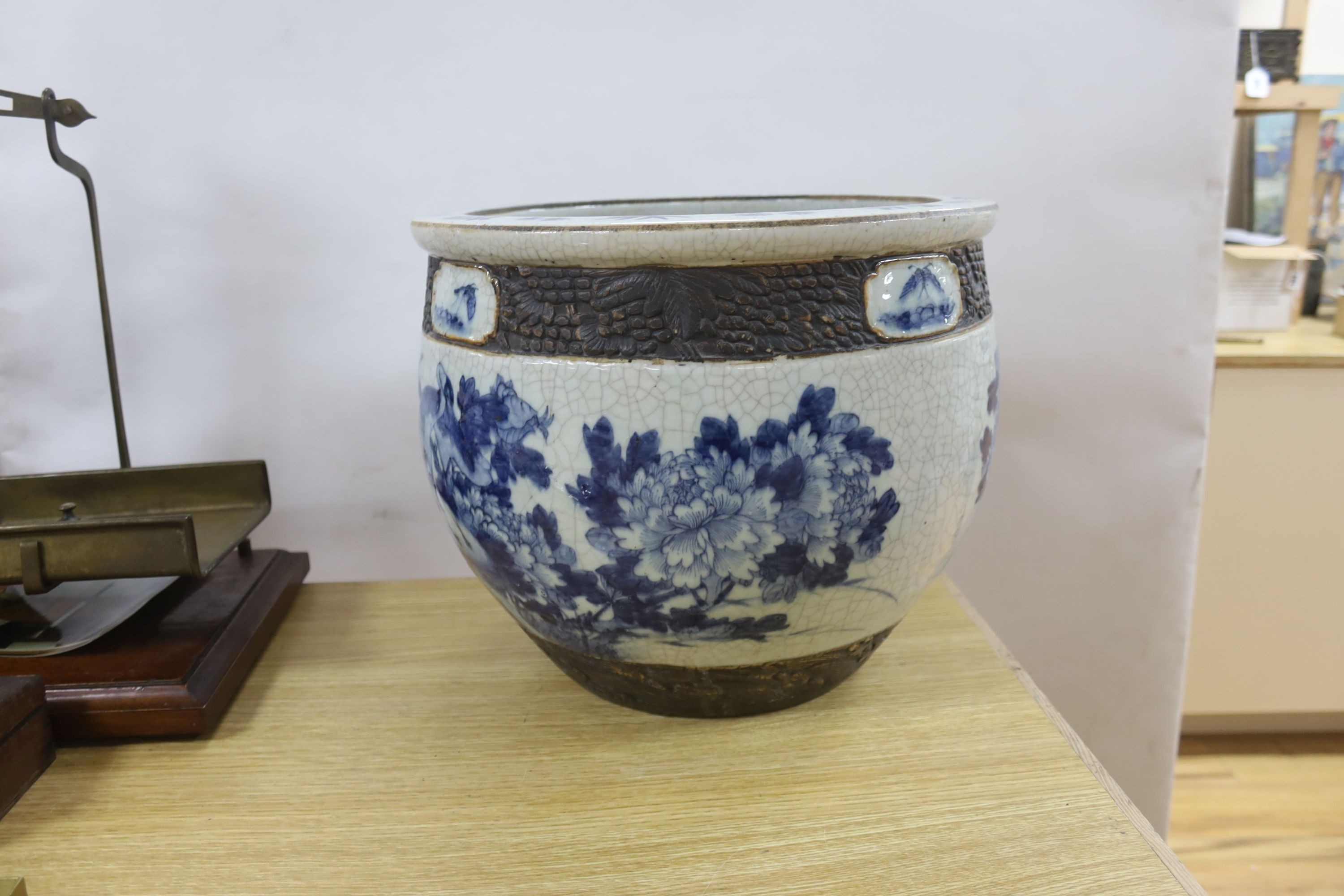 A late 19th/early 20th century Chinese blue and white crackleglaze jardiniere 30cm